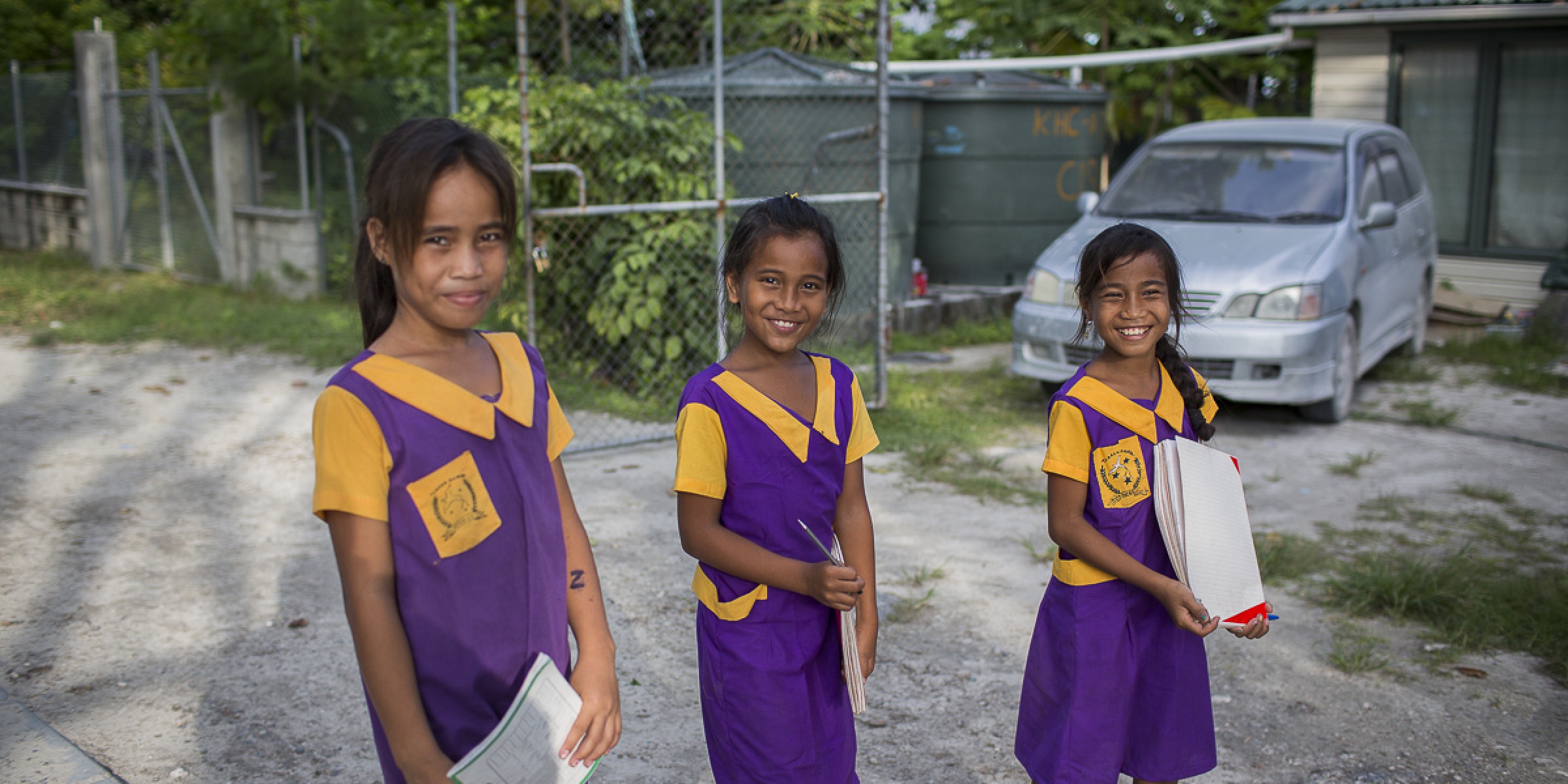 Girls walk home from school in Bairiki, one of the largest towns in South Tarawa, Kiribati. Credit: Conor Ashleigh / World Bank 2014
